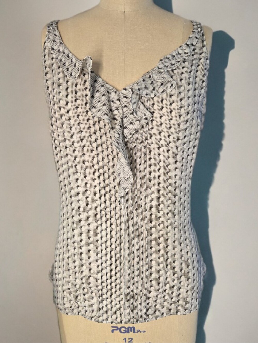 White and Black Printed Ruffle Front Sleeveless Top